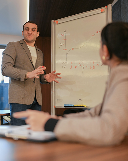 Businessman presenting with whiteboard